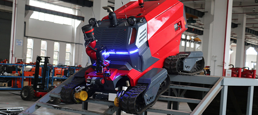 2-Emergency responders deploying Hitech remote firefighting robot