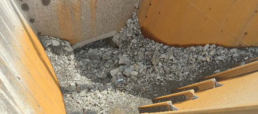 How a Rockbreaker Boom System operates at a jaw crusher inlet, optimizing material processing.