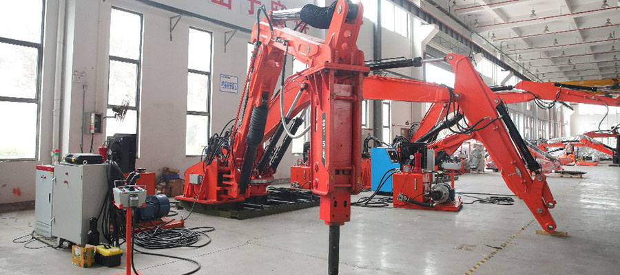 Rockbreaker Boom System expertly installed at the inlet of a jaw crusher, optimizing material processing.