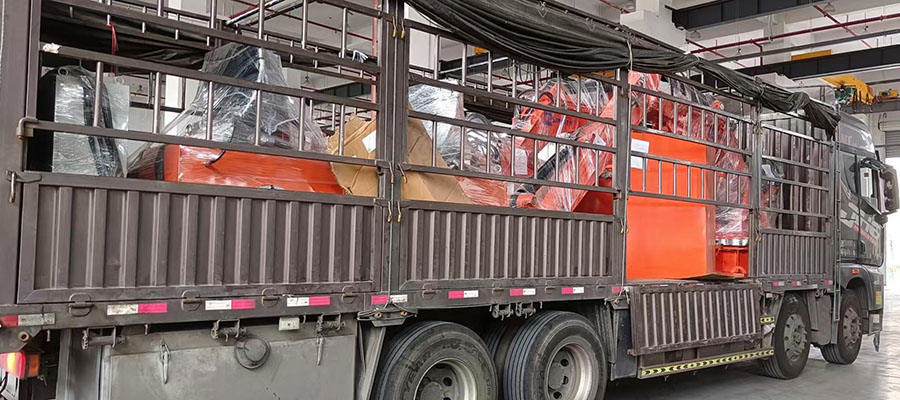 Preparing for the loading of Rockbreaker Boom System onto the transport vehicle.