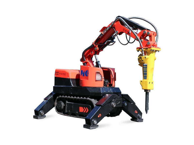 The HCR70D demolition robot featuring a compact chassis, articulating legs, and a hydraulic breaker attachment